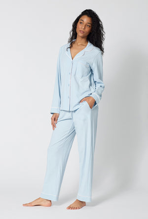 A lady wearing Blissful Blue Long Sleeve Classic Stretch Jersey Pj Set