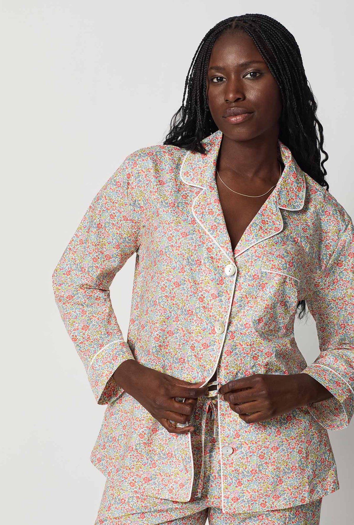 A closeup of A lady wearing Multi-Color Long Sleeve Classic Woven Tana Lawn® Pj Set Made With Liberty Fabric