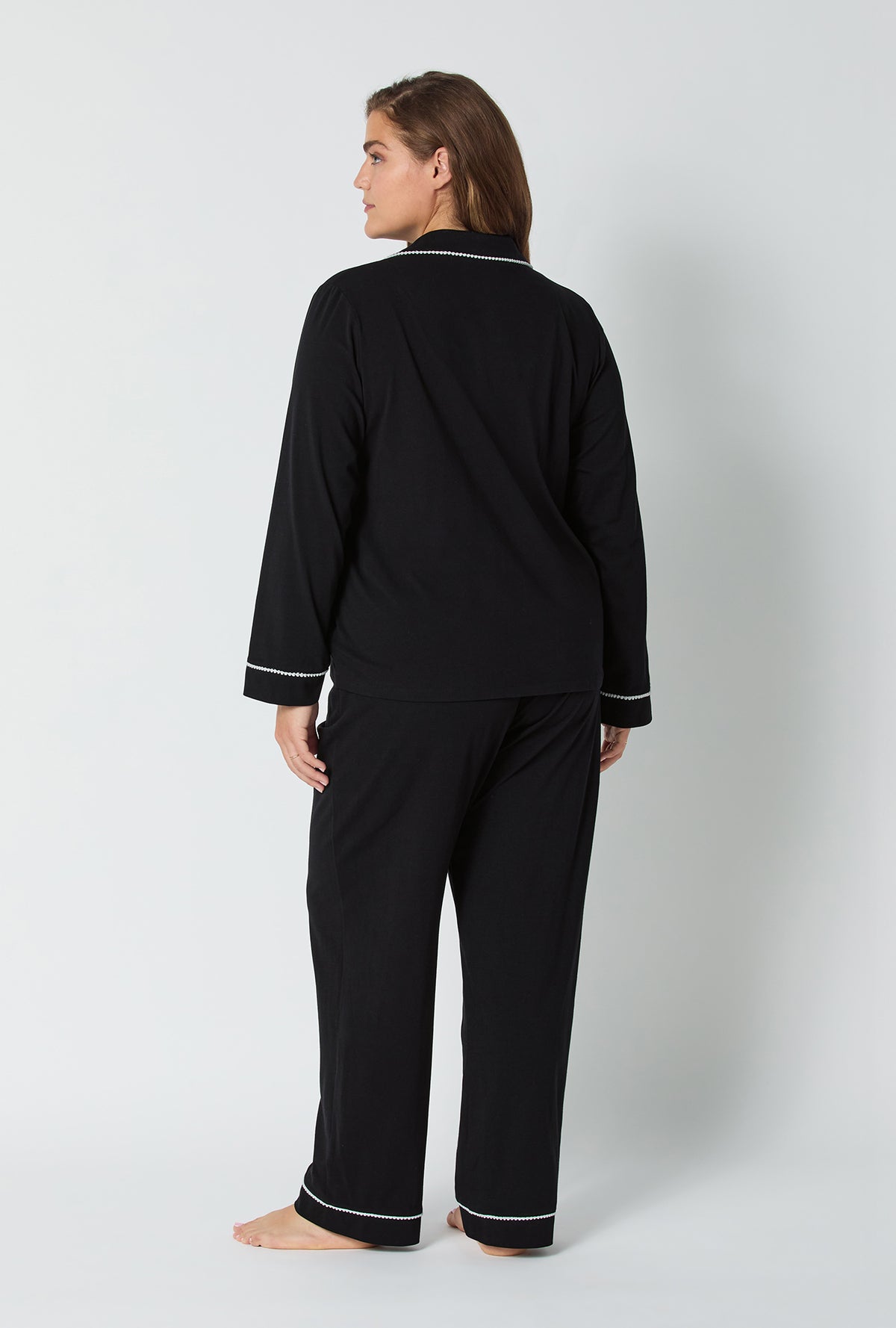 A lady wearing Black Beauty Long Sleeve Classic Stretch Jersey Pj Set
