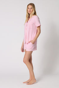 A lady wearing Pink Powder Short Sleeve Classic Shorty Stretch Jersey Pj Set