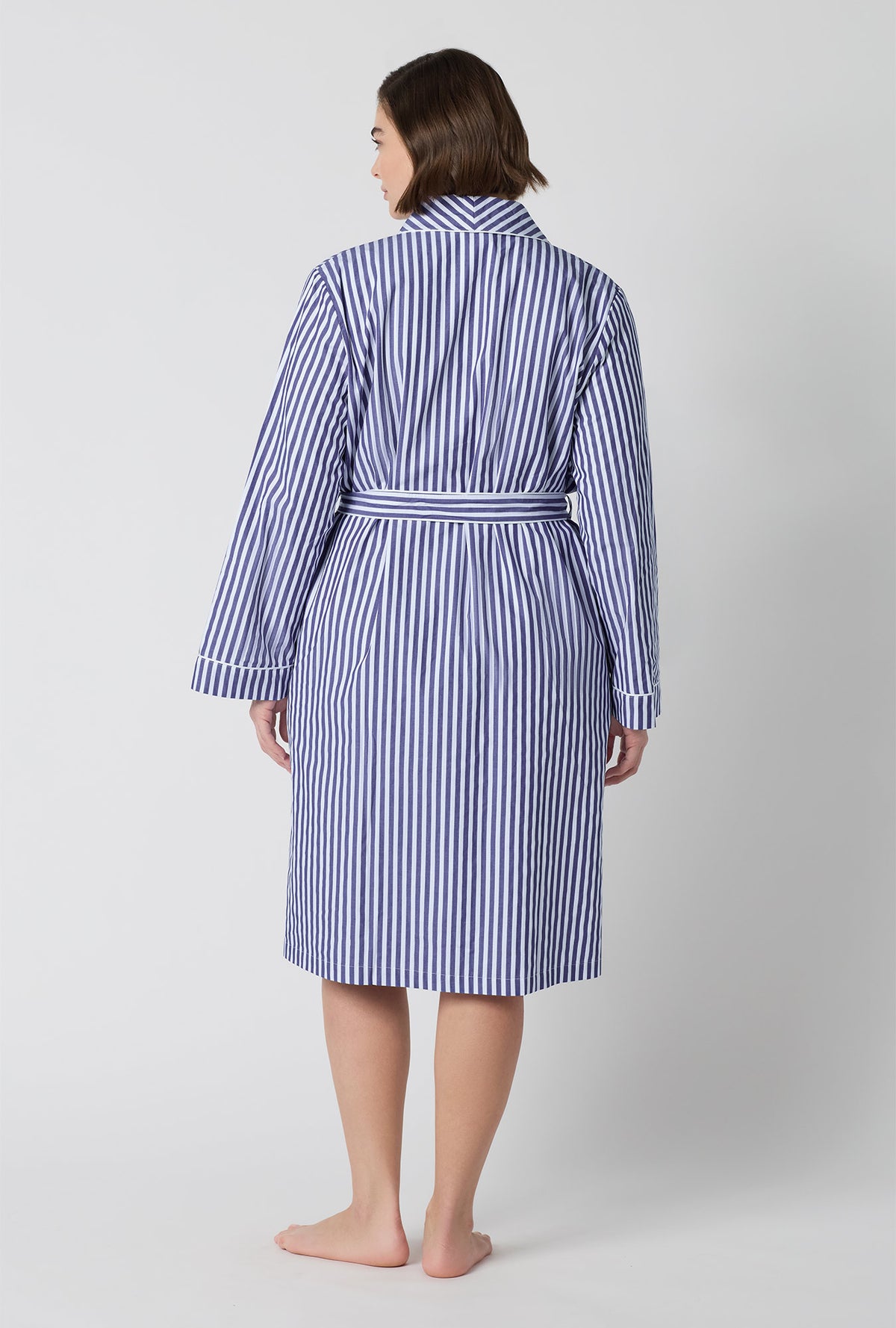 A Lady Wearing Plus Size Navy Signature Stripe Lined Woven Cotton Sateen Robe posing with a back view look