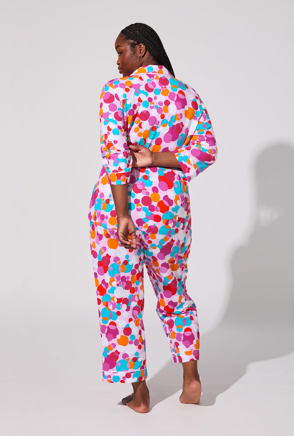 A lady wearing BedHead X Trina Turk Bubble Dots 3/4 Sleeve Classic Stretch Jersey Cropped PJ Set