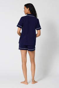 A lady wearing Midnight Navy Short Sleeve Classic Shorty Stretch Jersey Pj Set back view