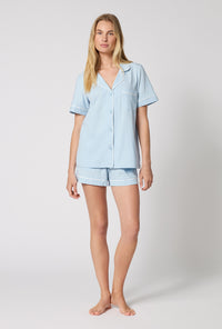 A lady wearing Blissful Blue Short Sleeve Classic Shorty Stretch Jersey Pj Set looking front