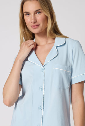 A lady wearing Blissful Blue Short Sleeve Classic Shorty Stretch Jersey Pj Set closer look