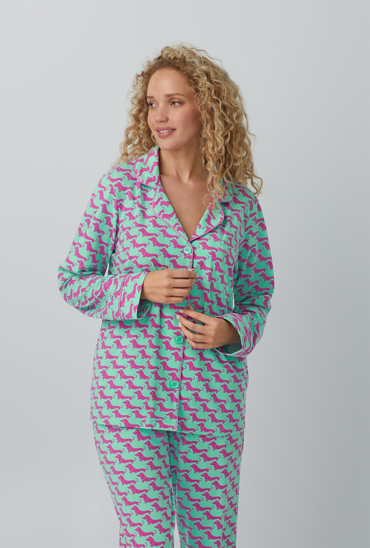 A lady wearing green Long Sleeve Classic Stretch Jersey PJ Set with Dog Walk print