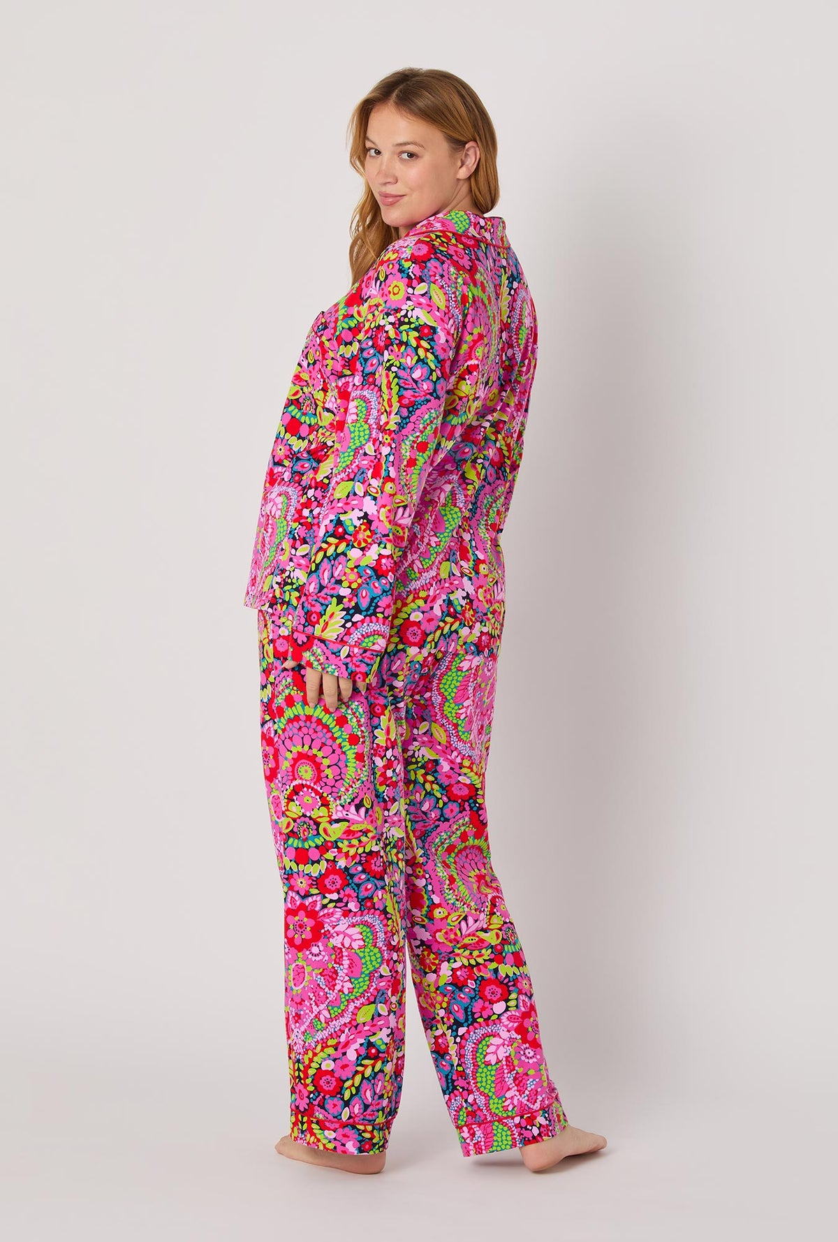 A lady wearing BedHead x Trina Turk Las Flores Long Sleeve Classic Stretch Jersey Pj Set