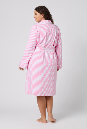 A Lady Wearing Plus Size Pink Signature Stripe Lined Woven Cotton Sateen Robe in a back view pose