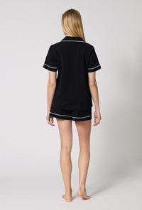 A lady wearing Black Beauty Short Sleeve Classic Shorty Stretch Jersey Pj Set back view