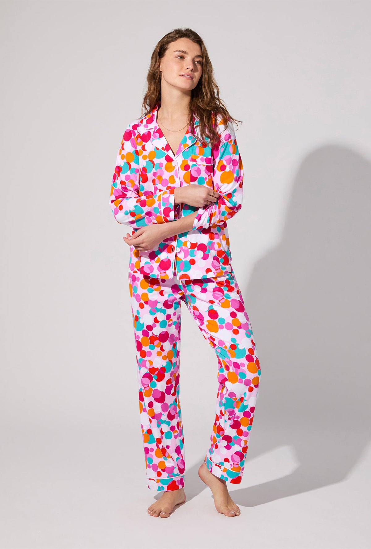 A lady wearing BedHead X Trina Turk Bubble Dots Long Sleeve Classic Stretch Jersey PJ Set