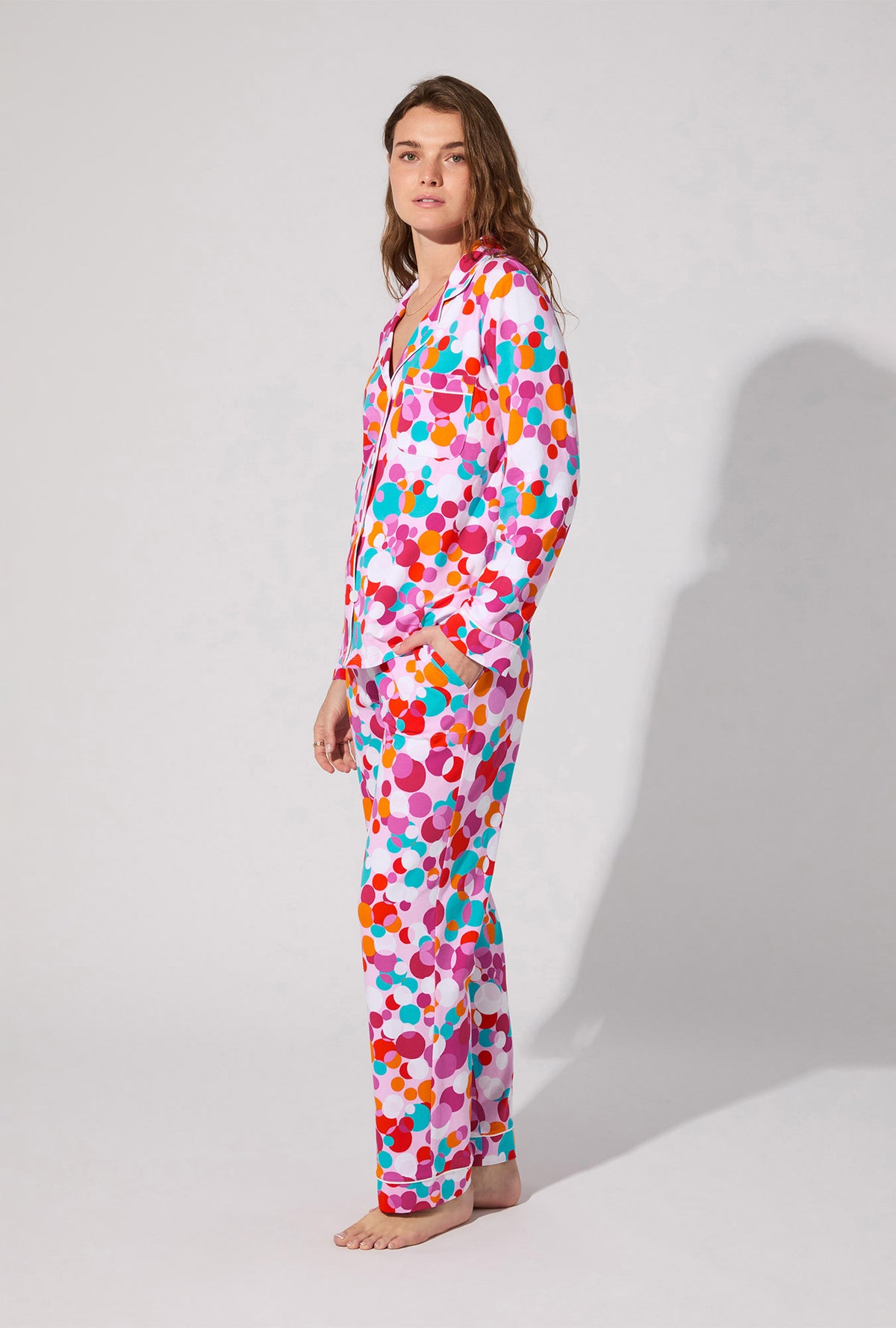 A lady wearing BedHead X Trina Turk Bubble Dots Long Sleeve Classic Stretch Jersey PJ Set