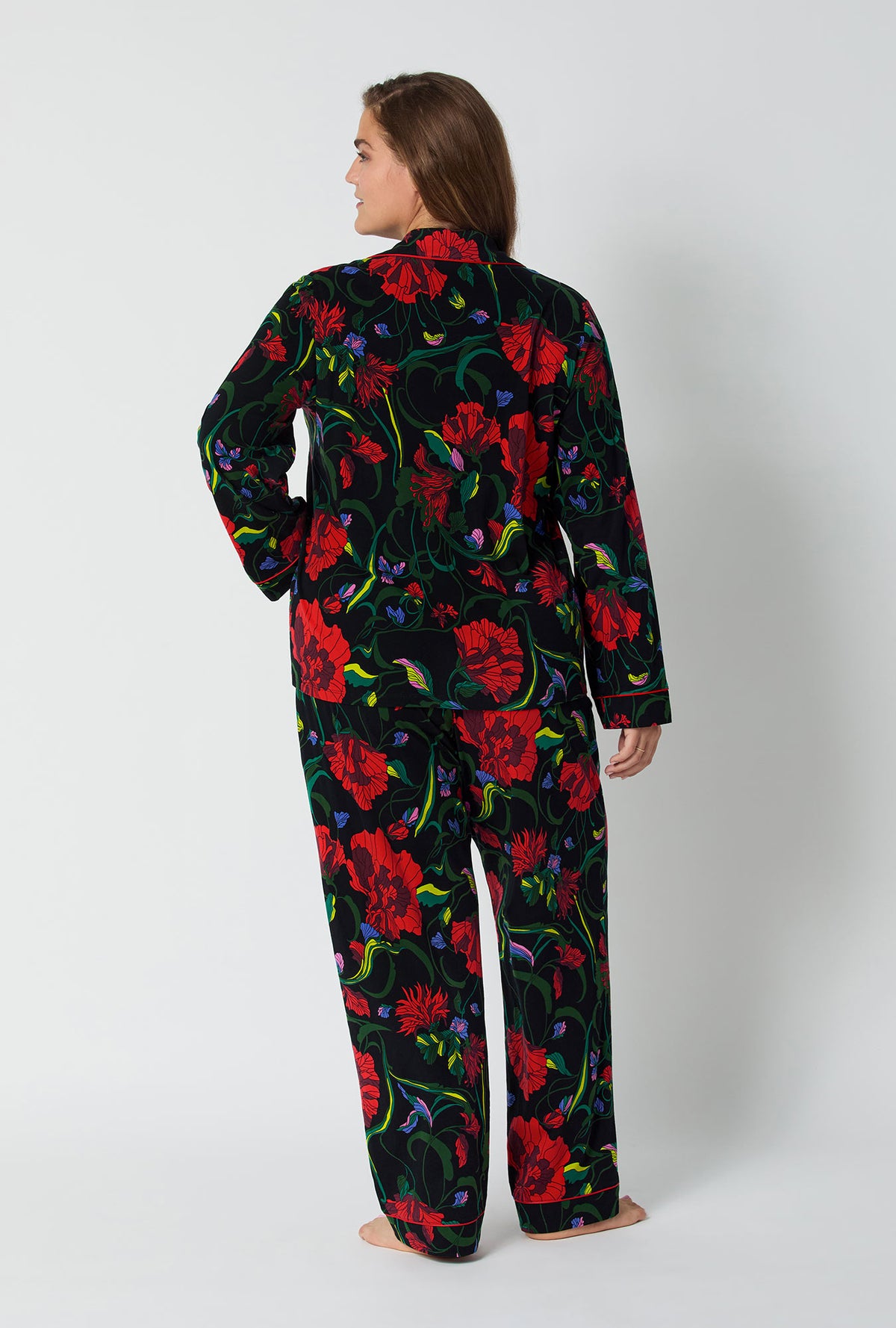 A lady wearing BedHead X Trina Turk Haute Floral Long Sleeve Classic Stretch Jersey Pj Set
