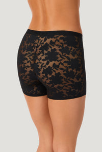 A lady wearing Black Stretch Lace Boxer Short Underwear back view