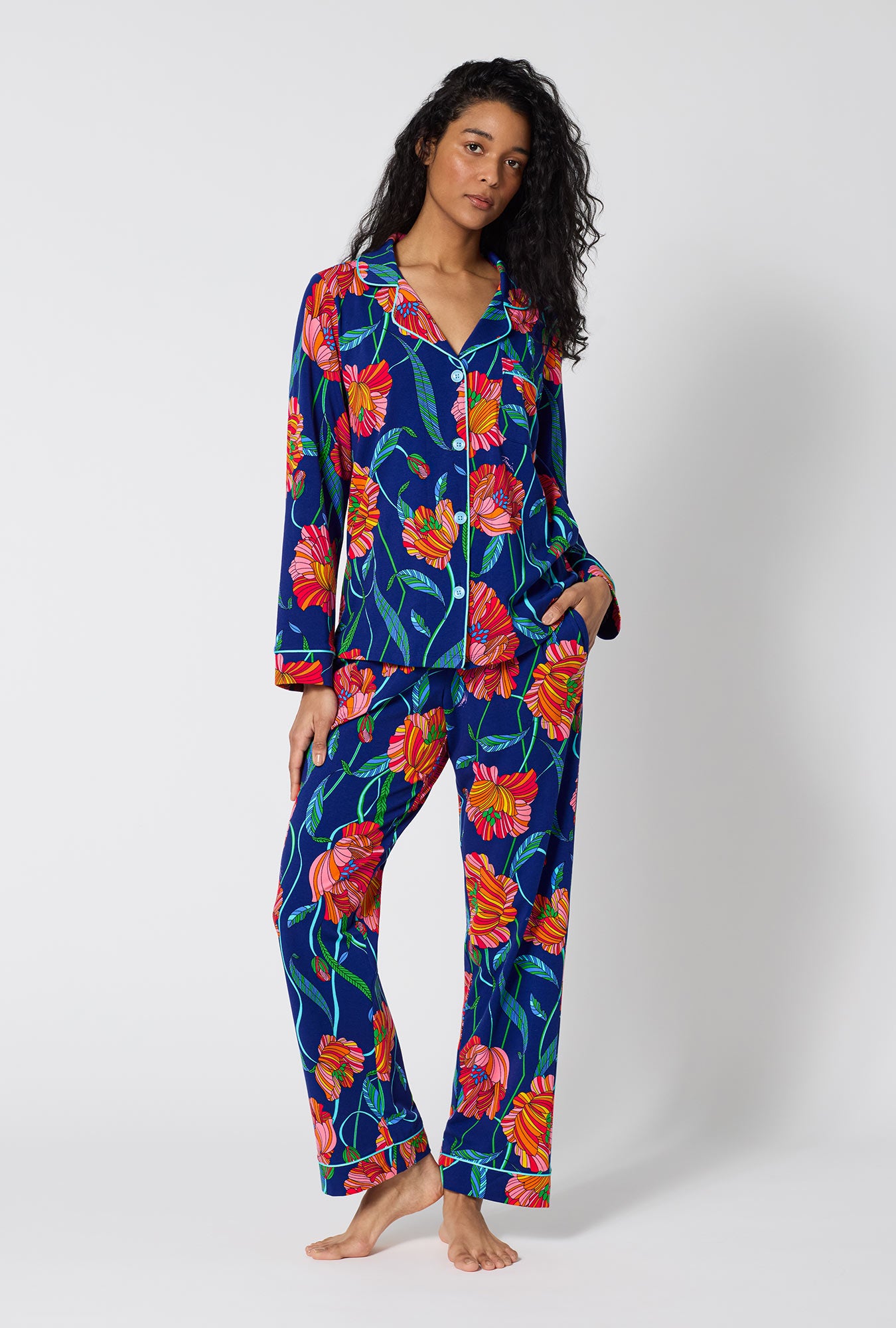 A Lady Wearing BedHead x Trina Turk Linear Poppy Long Sleeve Classic Stretch Jersey Pj Set