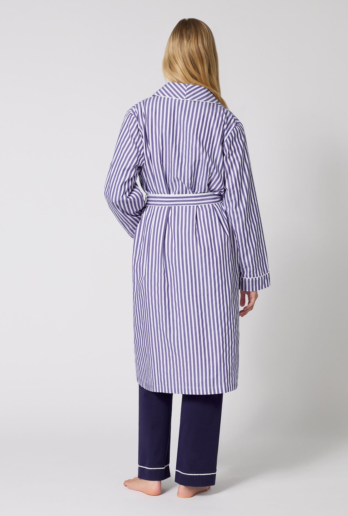 A Lady Wearing Navy Signature Stripe Lined Woven Cotton Sateen Robe facing back in a standing pose