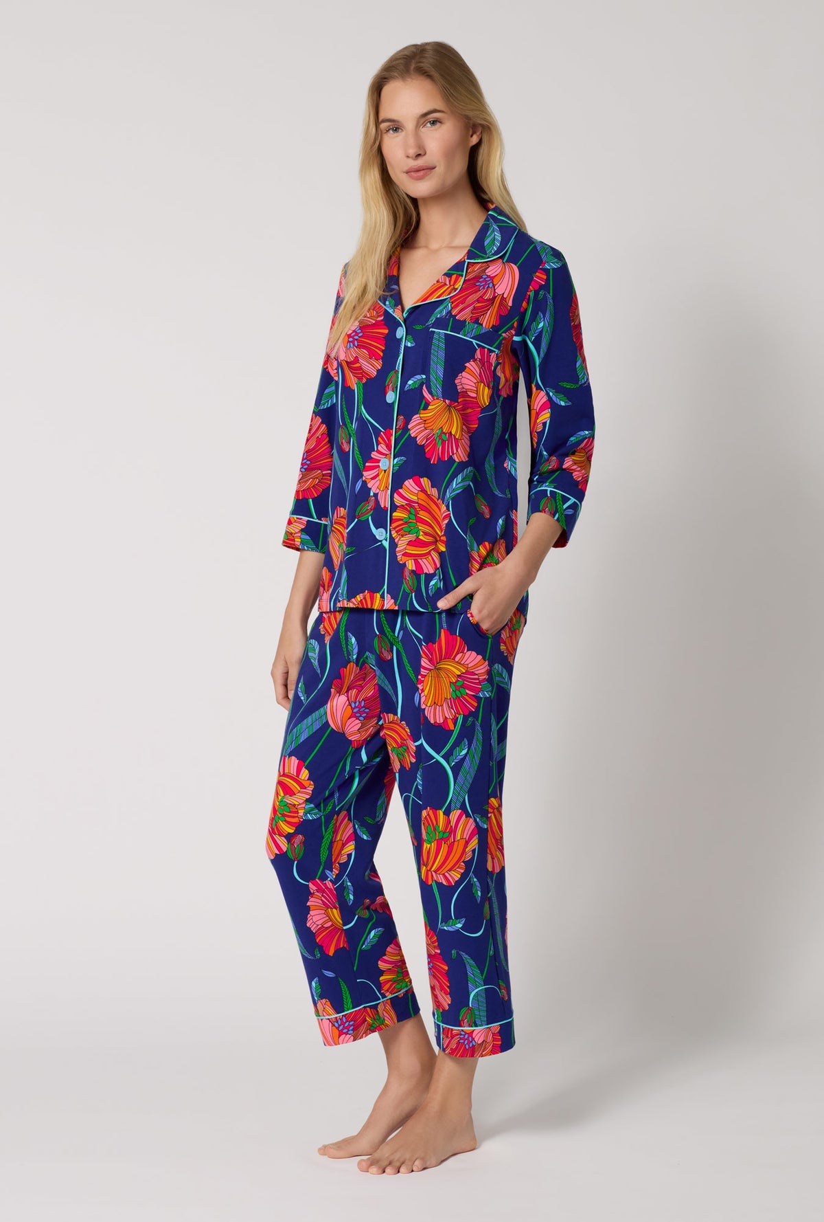 A Lady Wearing BedHead x Trina Turk Linear Poppy 3/4 Sleeve Classic Stretch Jersey Cropped Pj Set in a side angled pose