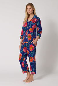 A Lady Wearing BedHead x Trina Turk Linear Poppy 3/4 Sleeve Classic Stretch Jersey Cropped Pj Set in a side angled pose