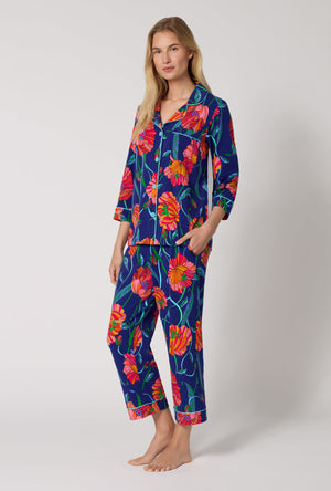 A Lady Wearing BedHead x Trina Turk Linear Poppy 3/4 Sleeve Classic Stretch Jersey Cropped Pj Set in a side angled pose