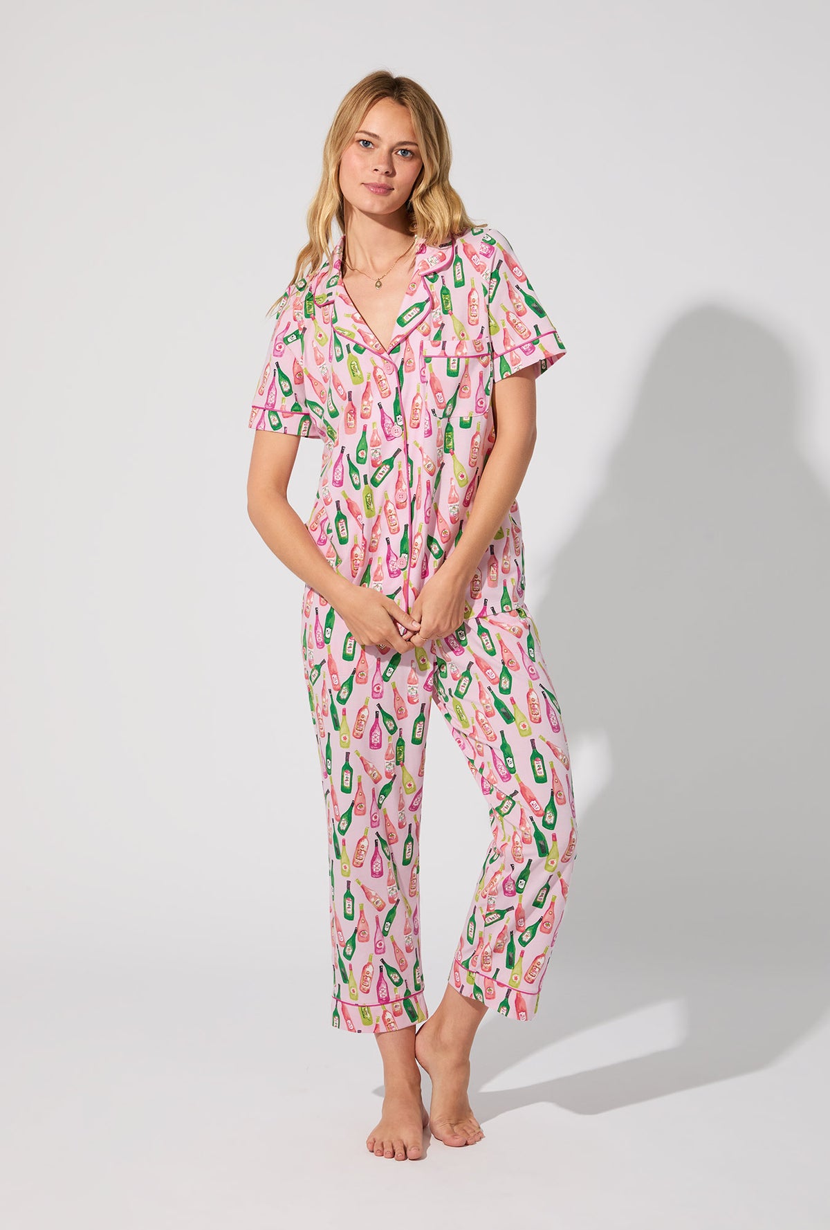 A lady wearing Wine Tour Short Sleeve Classic Stretch Jersey Cropped PJ Set