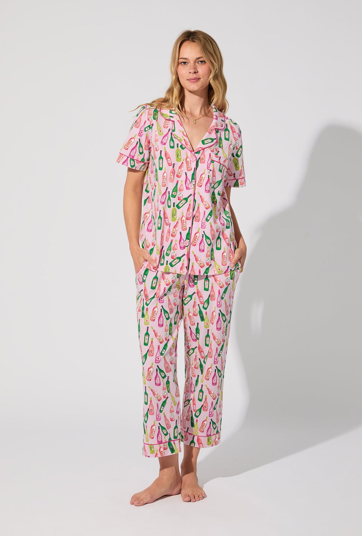 A lady wearing Wine Tour Short Sleeve Classic Stretch Jersey Cropped PJ Set