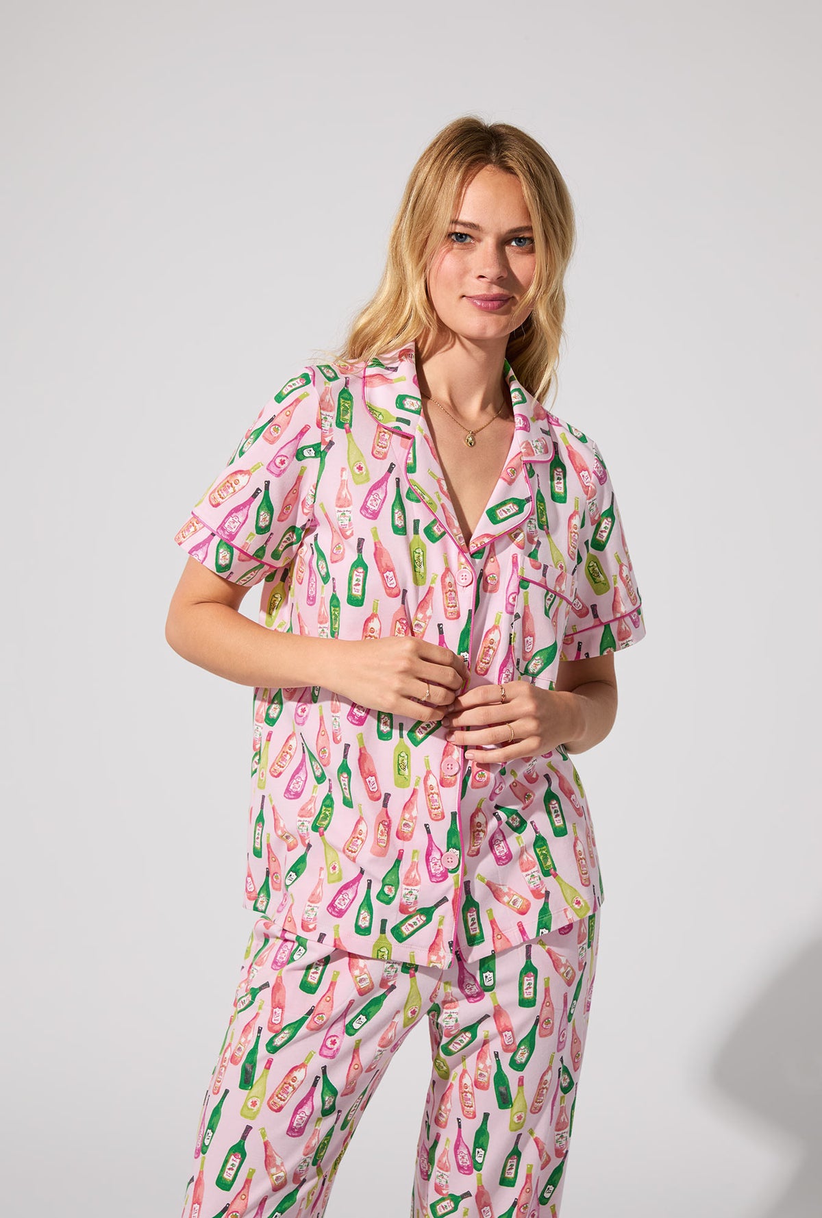 A lady wearing Wine Tour Short Sleeve Classic Stretch Jersey Cropped PJ Set