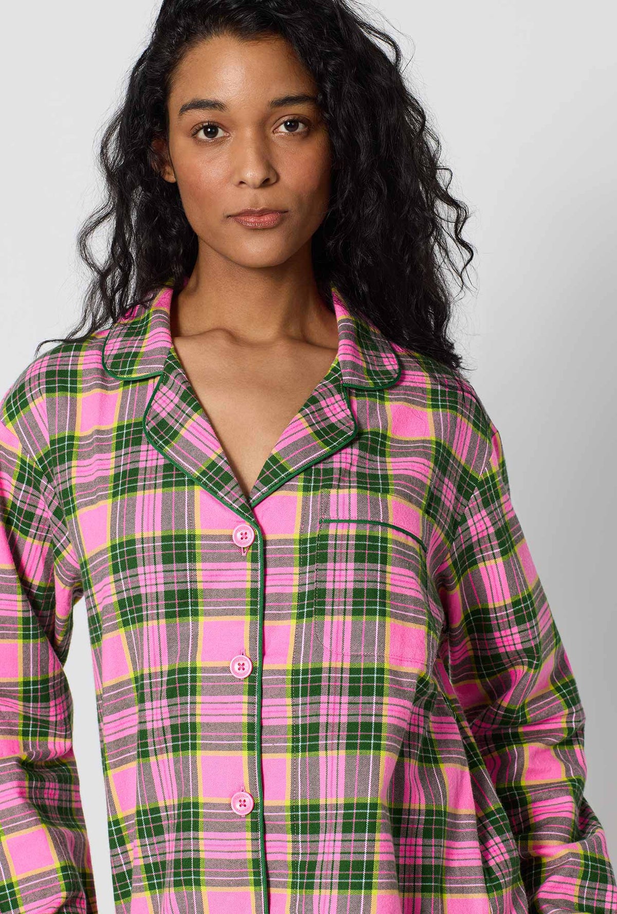 A Lady Wearing BedHead x Trina Turk Palm Springs Tartan Long Sleeve Classic Woven Portuguese Flannel Pj Set in a close up shot