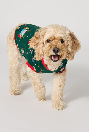 A Dog wearing Good Grief, It's Christmas! Stretch Jersey Dog Pajama walking