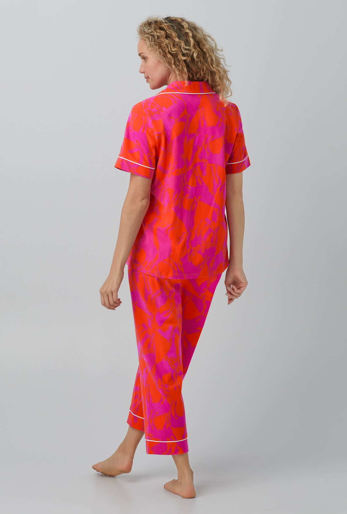 A lady wearing Giraffes Short Sleeve Classic Stretch Jersey Cropped PJ Set