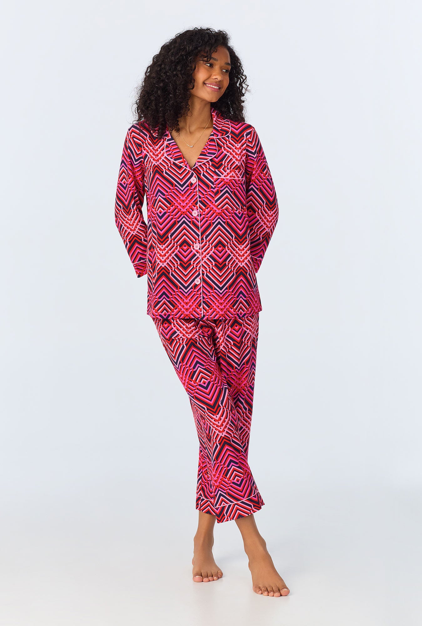 A lady wearing Geo Trellis 3/4 Sleeve Classic Stretch Jersey Cropped PJ Set