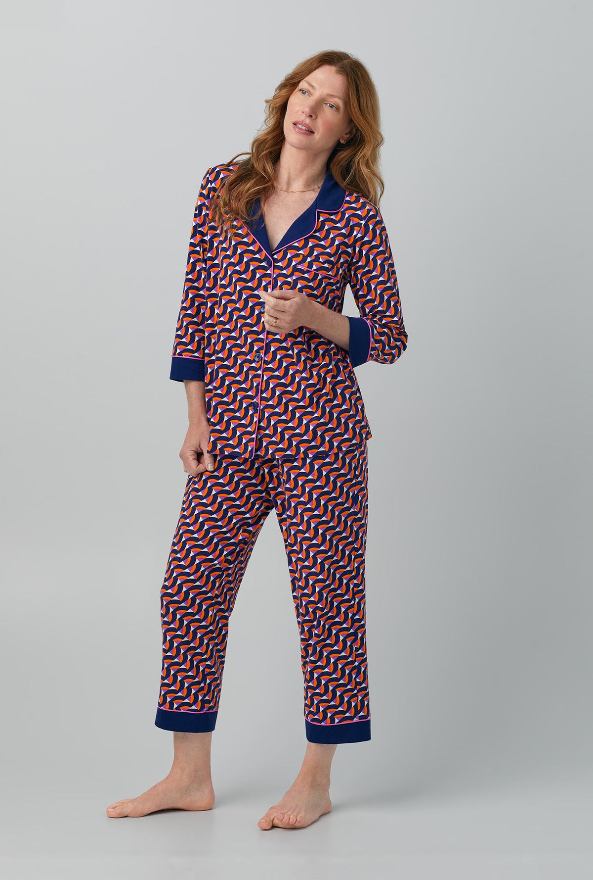 A lady wearing Geo Rainbow 3/4 Sleeve Classic Stretch Jersey PJ Set