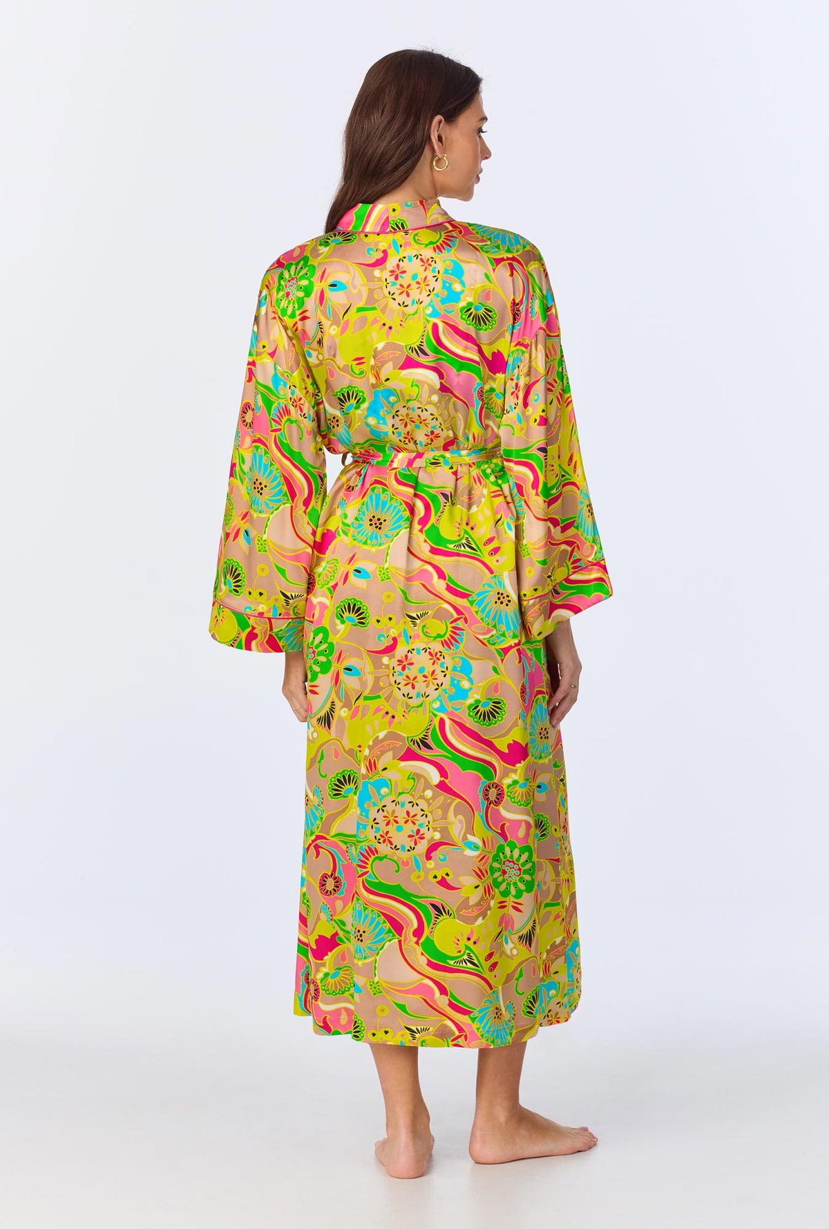A lady wearing BedHead x Trina Turk Heritage Woven Washable Silk Satin Robe