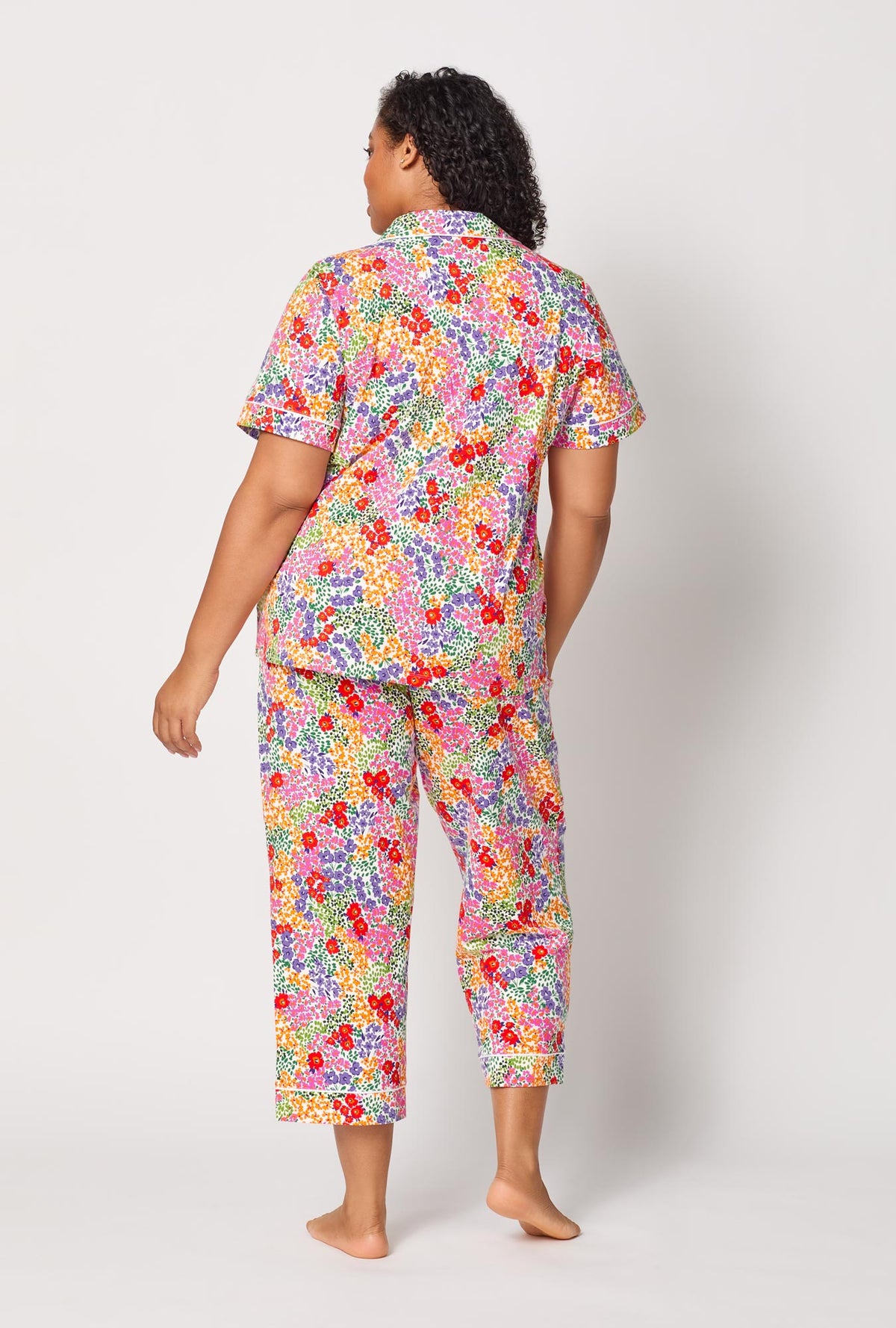 A lady wearing plus size Spring Fields Short Sleeve Classic Stretch Jersey Cropped Pj Set