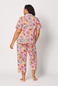 A lady wearing plus size Spring Fields Short Sleeve Classic Stretch Jersey Cropped Pj Set