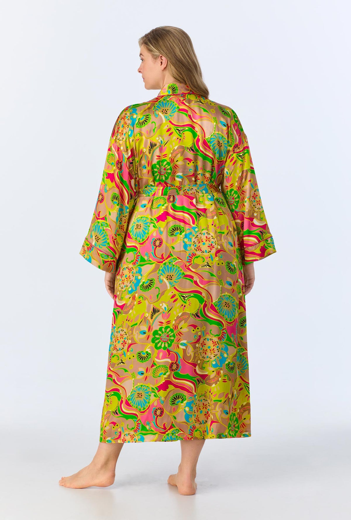 A lady wearing BedHead x Trina Turk Heritage Woven Washable Silk Satin Robe