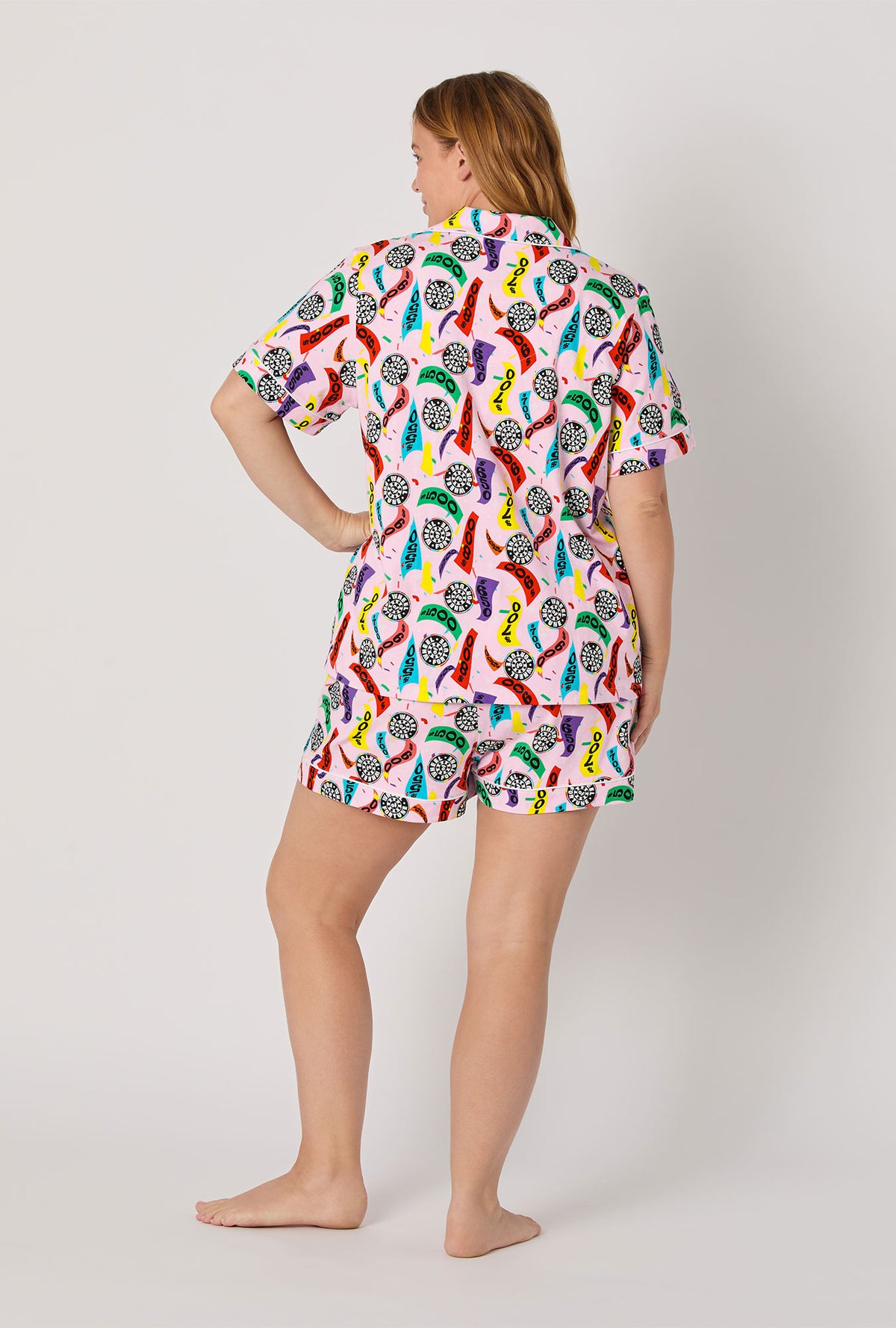 A lady wearing Spin To Win Short Sleeve Classic Shorty Stretch Jersey Pj Set