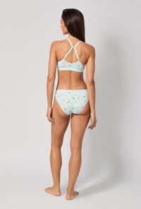 A lady wearing Magnolia Breeze Stretch Jersey Bralette