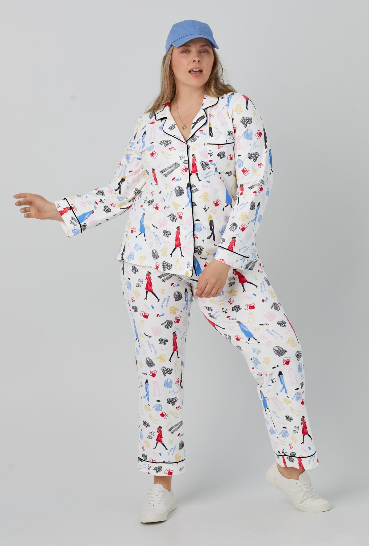 A lady wearing  white Long Sleeve Classic Stretch Jersey PJ Set with Cest Chic  print