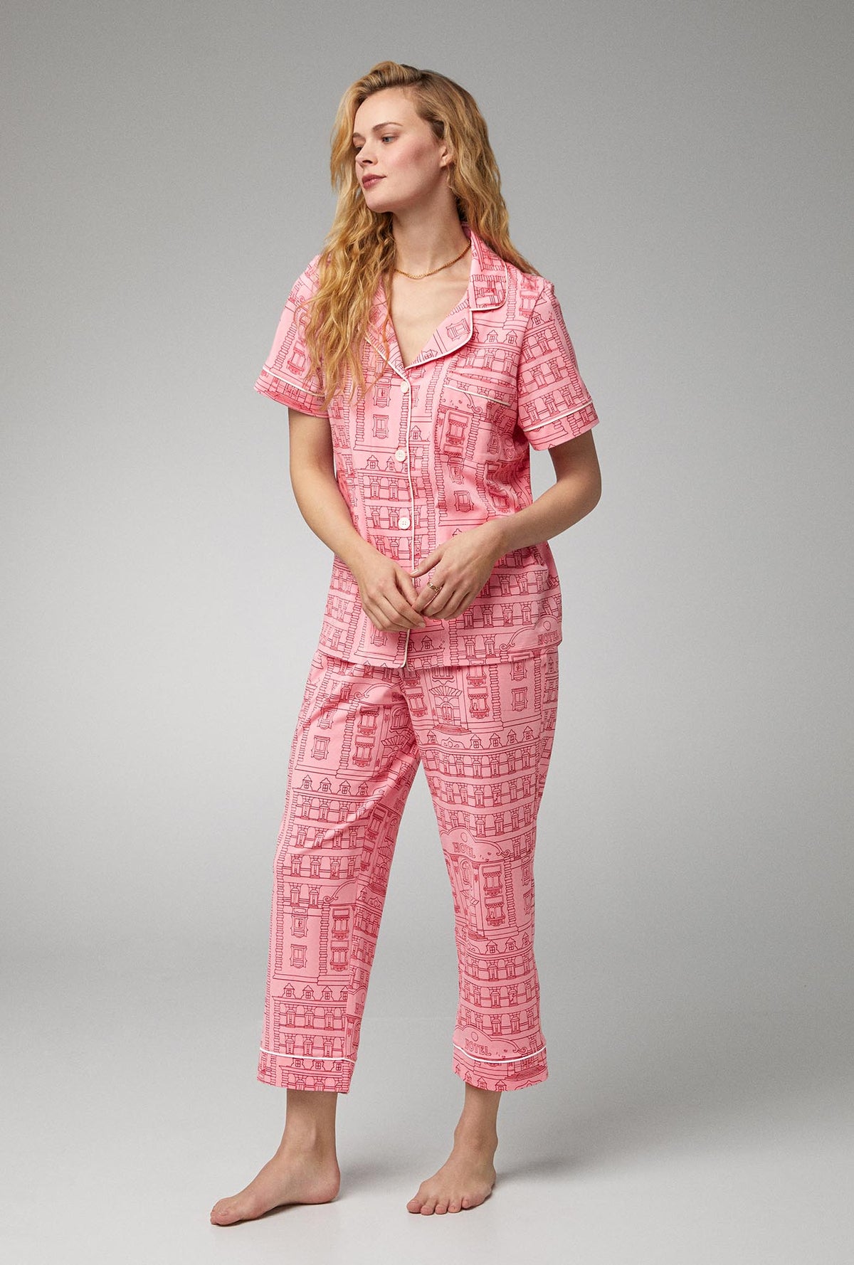 A lady wearing short sleeve classic stretch jersey cropped pj set with grand hotel print