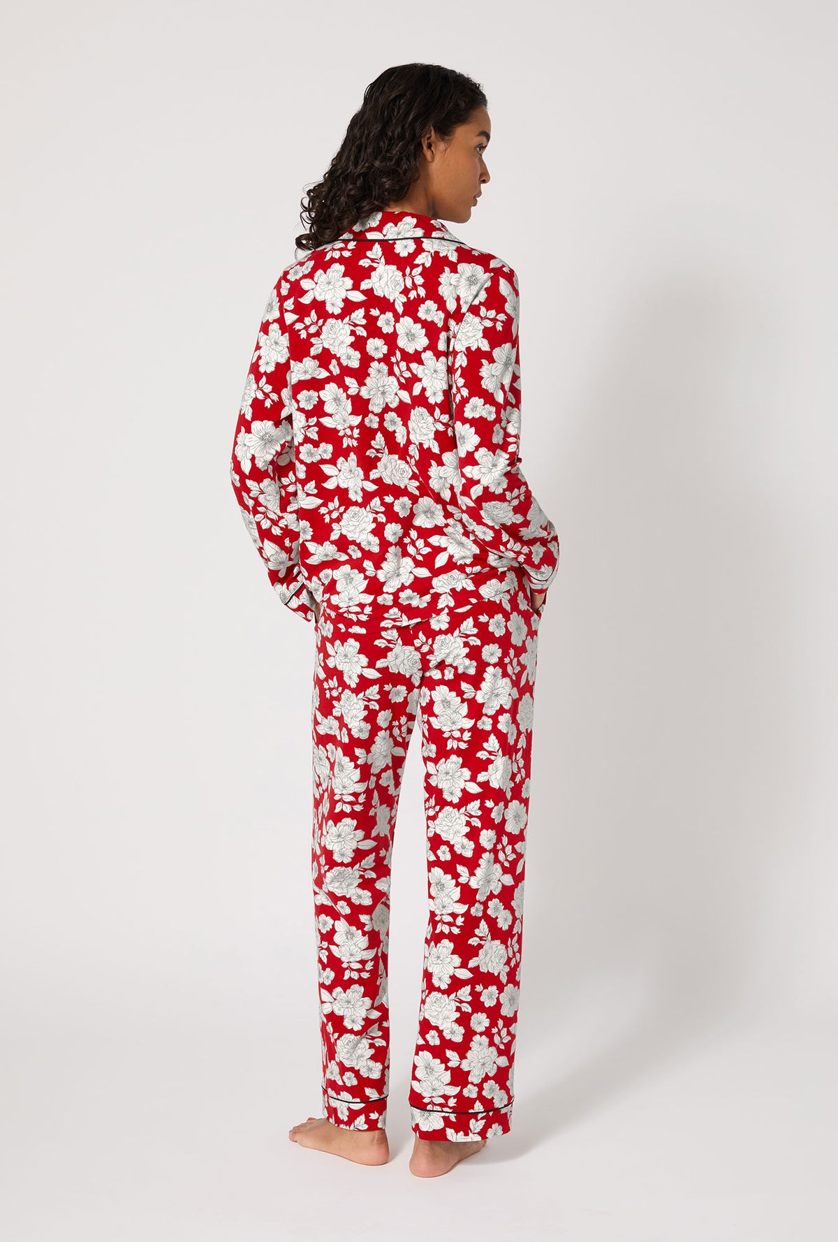 A lady wearing Floral Charm Long Sleeve Classic Stretch Jersey Pj Set