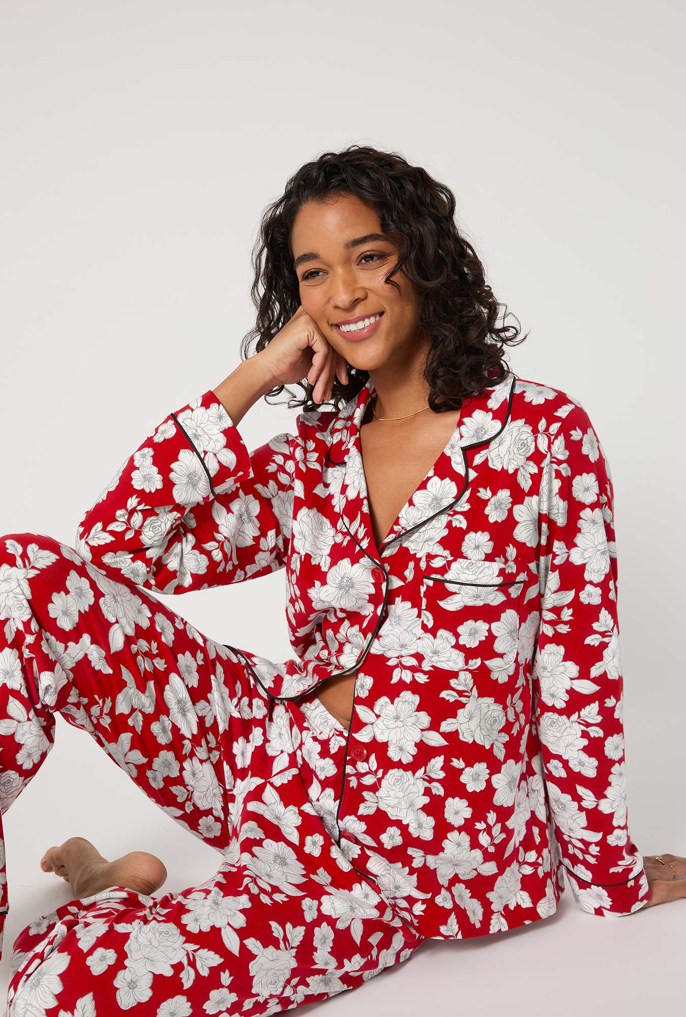 A lady wearing Floral Charm Long Sleeve Classic Stretch Jersey Pj Set