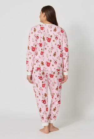 A lady wearing plus size Candy And Cocoa Long Sleeve Pullover Crew And Jogger Stretch Jersey Pj Set back view