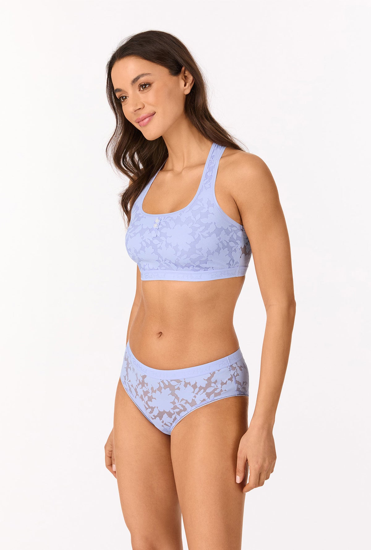 A lady wearing Blue Skies Stretch Lace Racerback Tank Bra