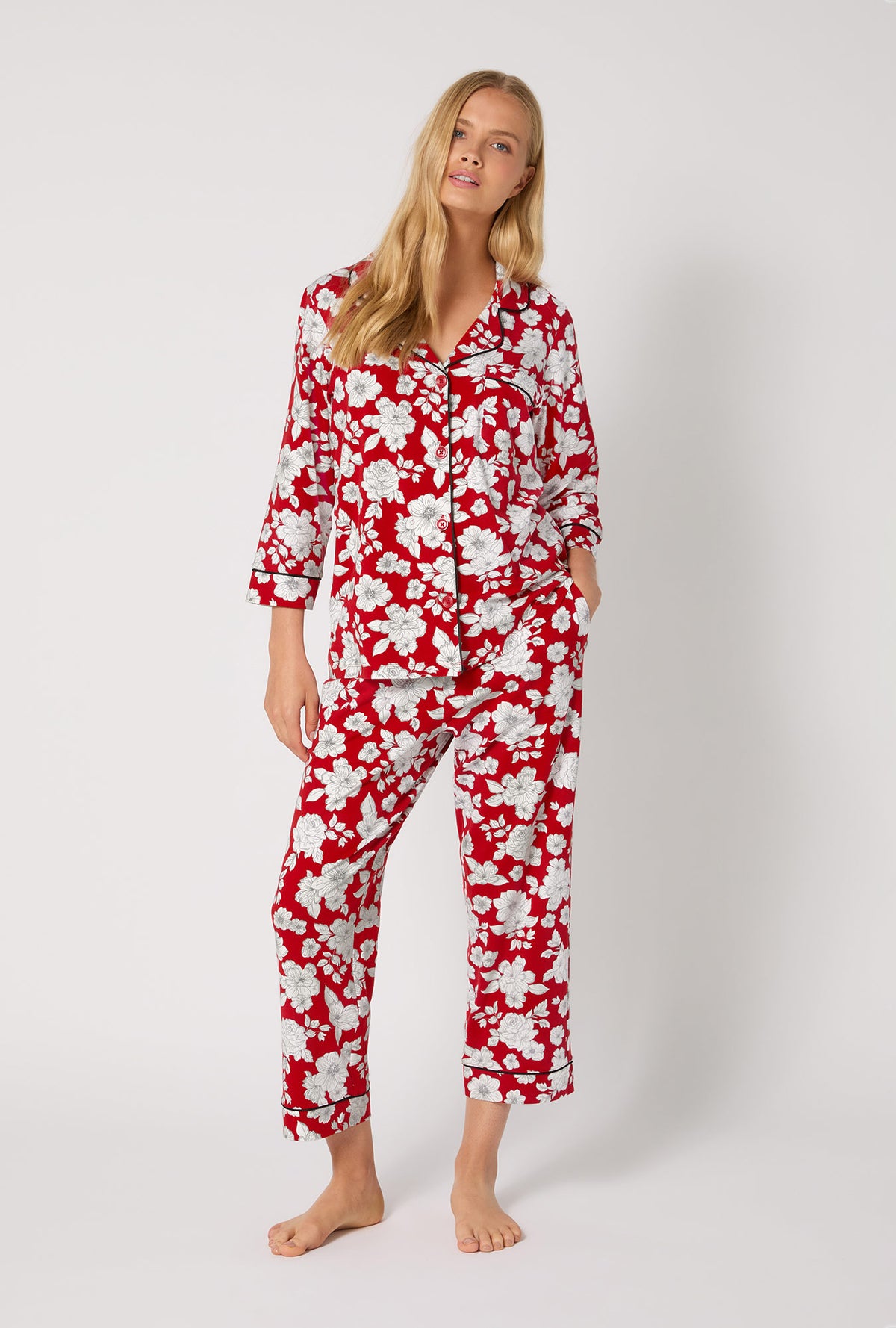 A lady wearing Floral Charm 3/4 Sleeve Classic Stretch Jersey Cropped Pj Set