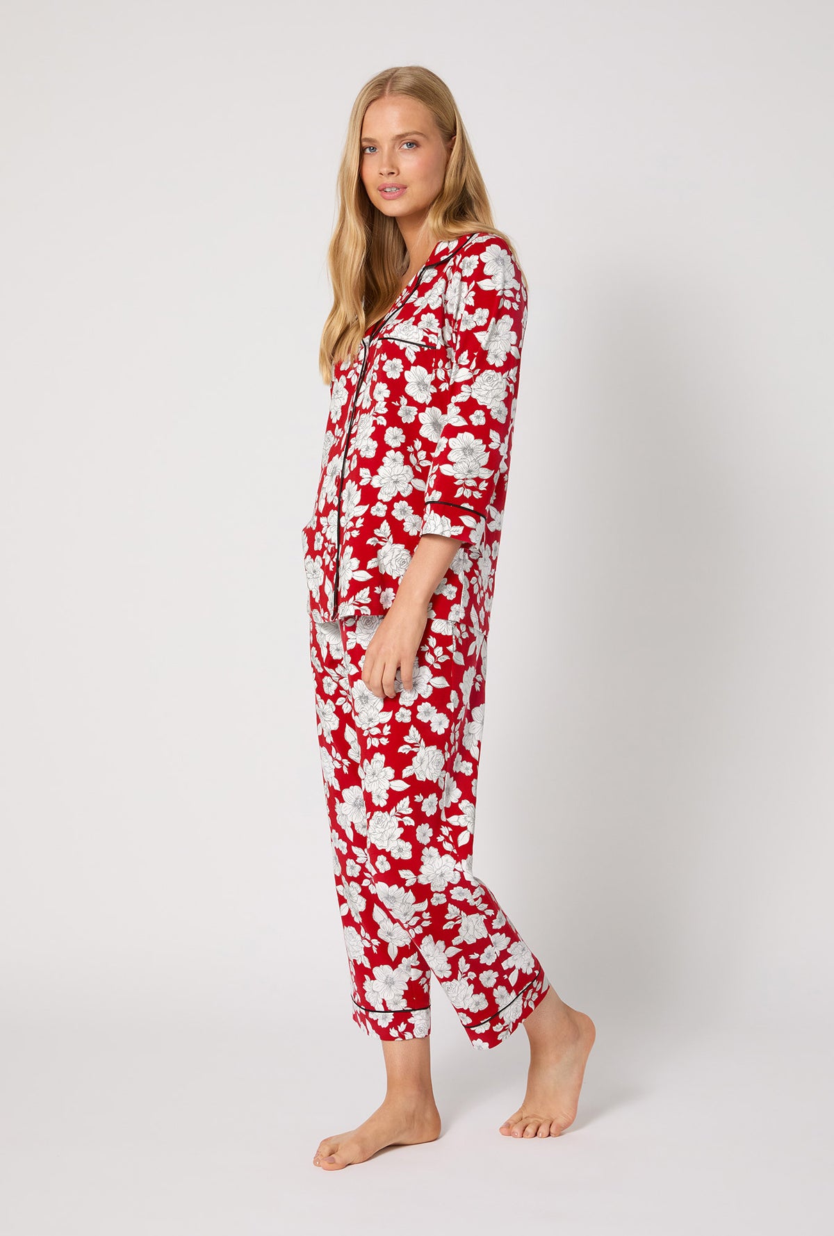 A lady wearing Floral Charm 3/4 Sleeve Classic Stretch Jersey Cropped Pj Set