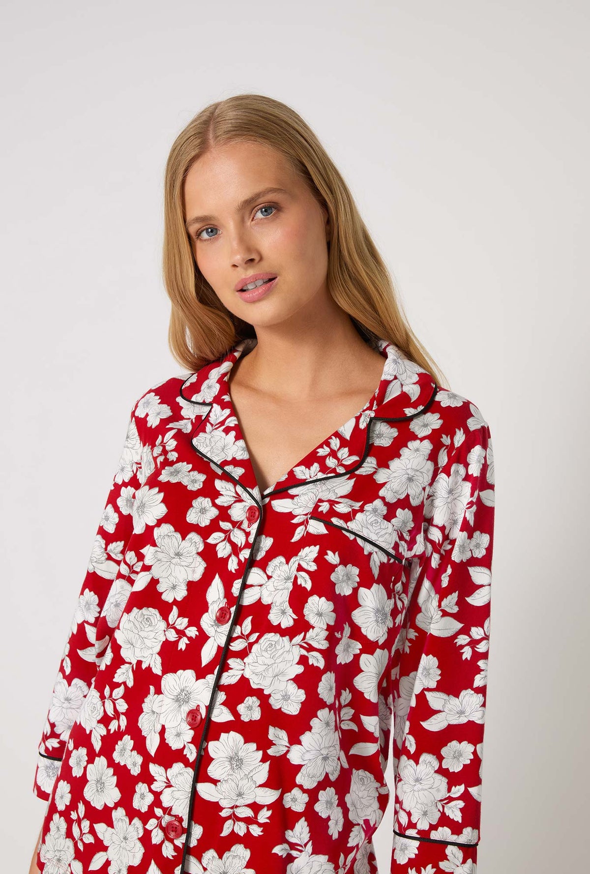 A lady wearing Floral Charm 3/4 Sleeve Classic Stretch Jersey Cropped Pj Set