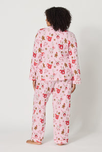 A lady wearing plus size Candy And Cocoa Long Sleeve Classic Stretch Jersey Pj Set back view