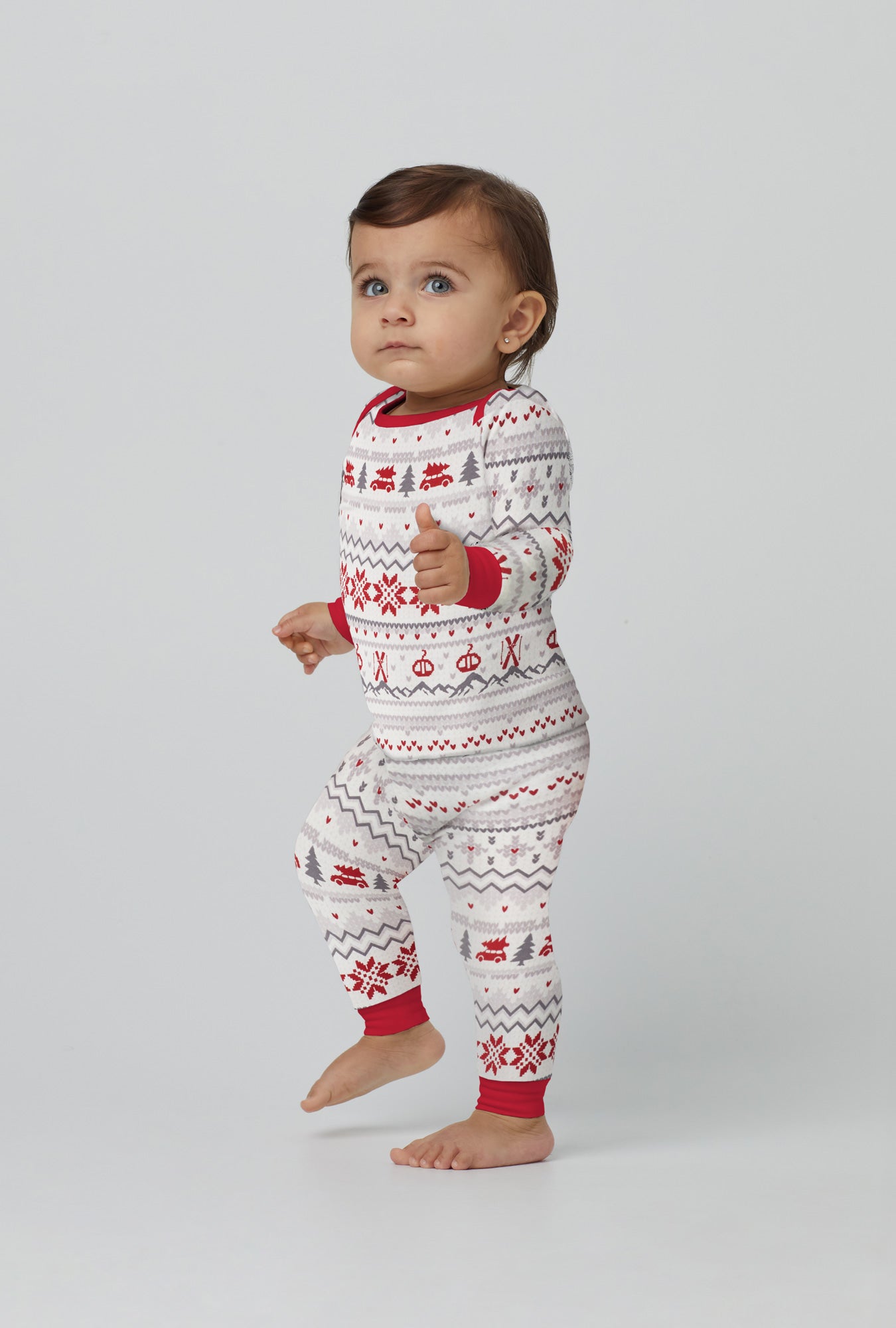 A baby wearing white  Long Sleeve Stretch Jersey Boo Boo PJ Set with Alpine Fair print