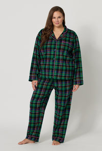 A lady wearing plus size Winter Plaid Long Sleeve Classic Woven Portuguese Flannel Pj Set