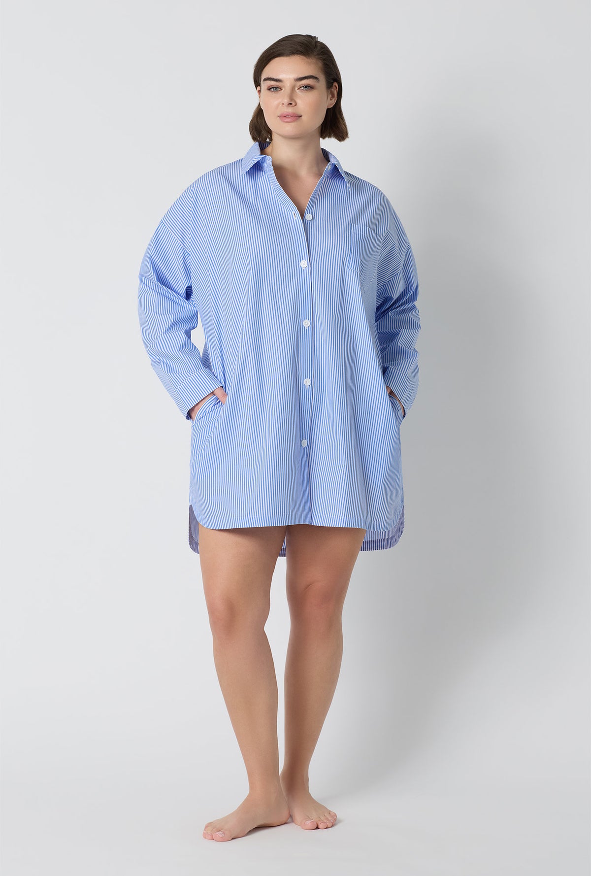 A Lady Wearing Plus Size French Stripe High Low Woven Supersoft Cotton Poplin Boyfriend Shirt