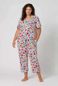 A Lady Wearing Plus Size Ottoman Bloom Short Sleeve Classic Stretch Jersey Cropped Pj Set